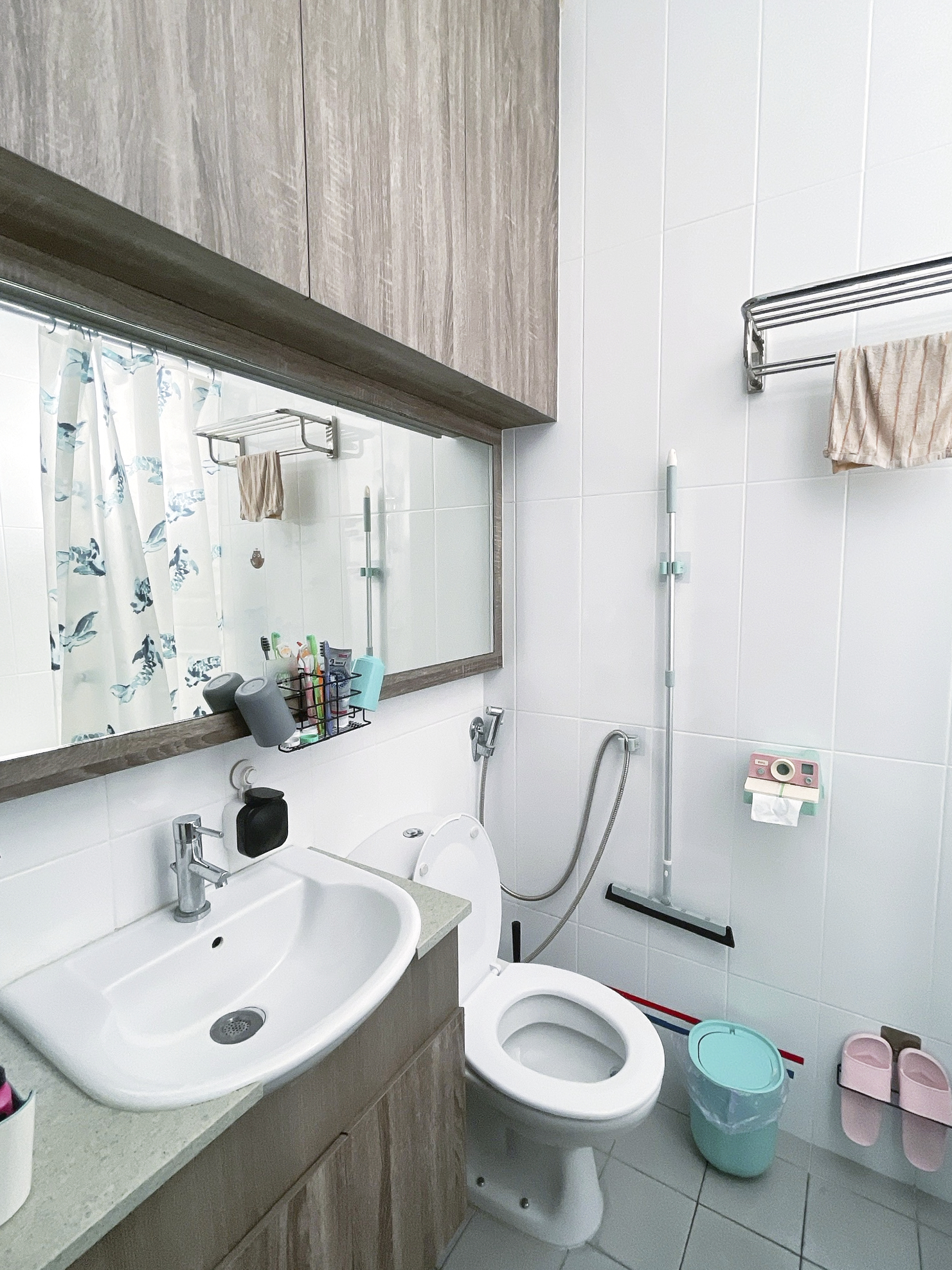 Our Colourful Personalities Imprinted On Our Apartment - White bathroom with modern design, wooden cabinet, large mirror