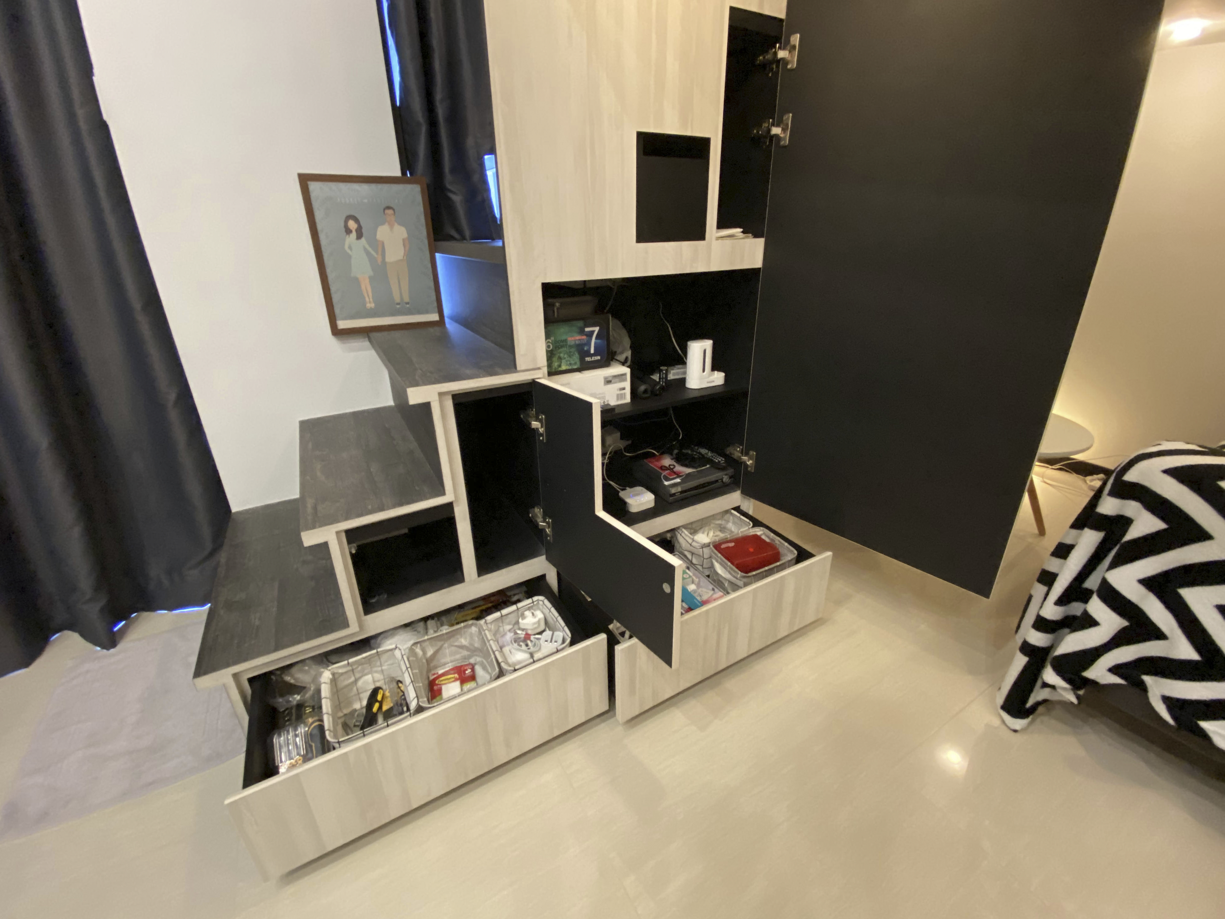 Our Smart Apartment That Might Be Smarter Than Us - Wooden cabinet with open drawers, black and white interior, neatly