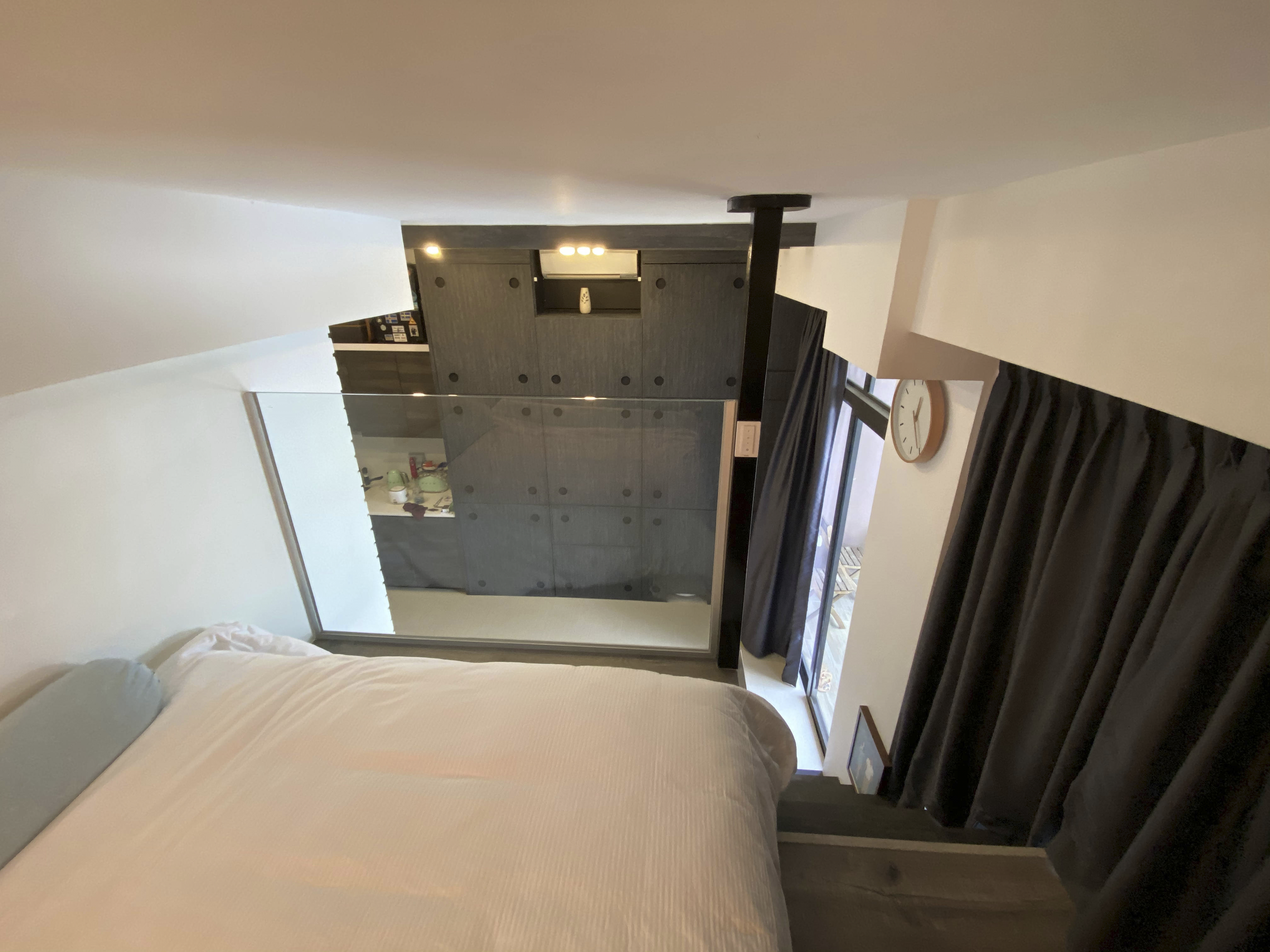 Our Smart Apartment That Might Be Smarter Than Us - Modern bedroom interior, minimalist design, large bed with white linens