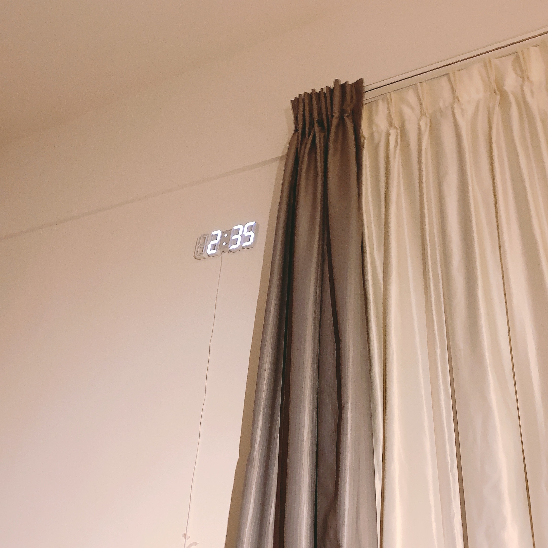 K-pop, Anime, Harry Potter - The Room that Has It All - Digital clock displaying 2:35, beige curtains, modern interior, light