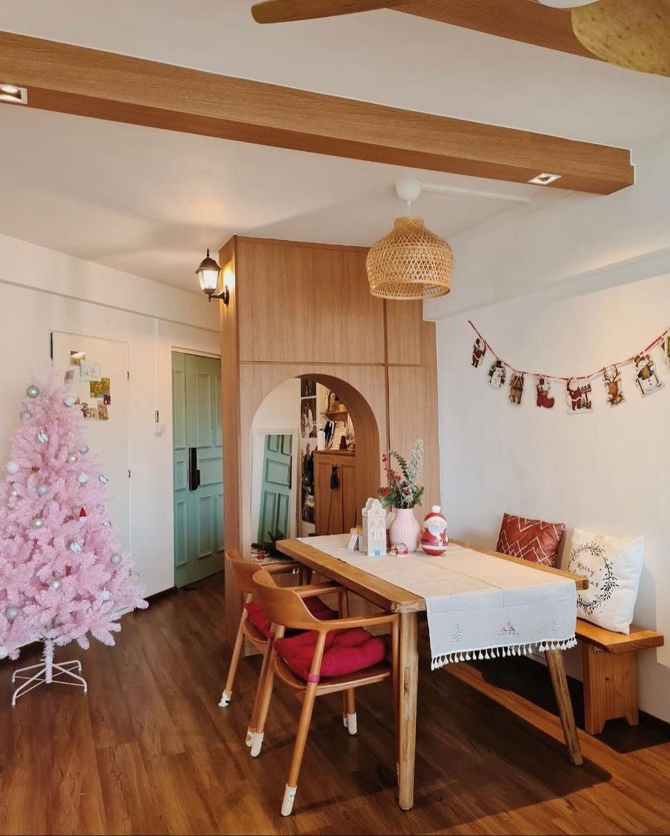 Created our version of modern farmhouse - Wooden dining table, pink Christmas tree, festive decorations, wicker pendant