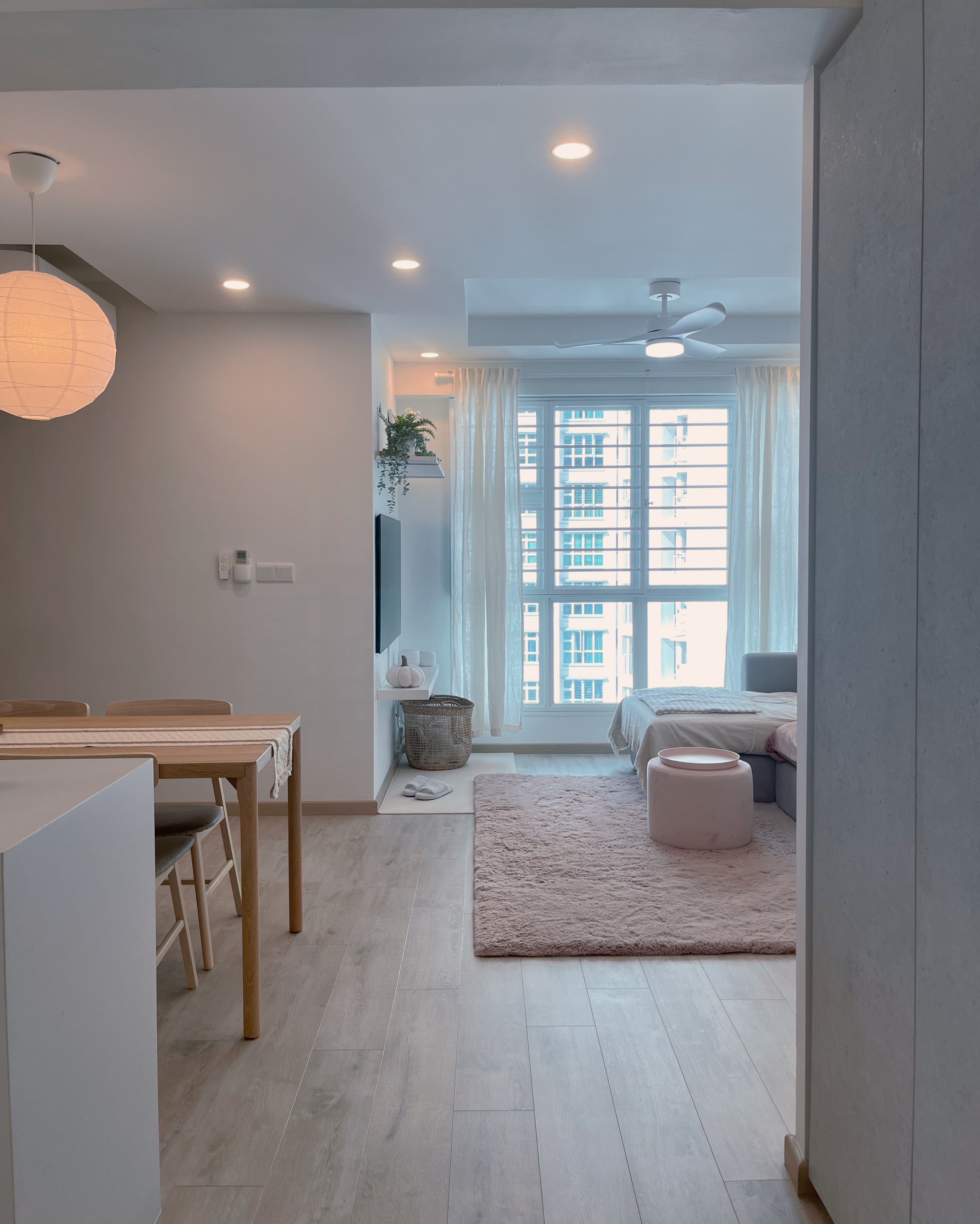 Living In A Cosy 3-room Flat with Minimal Housekeeping - Modern minimalist bedroom, neutral color palette, large window, soft